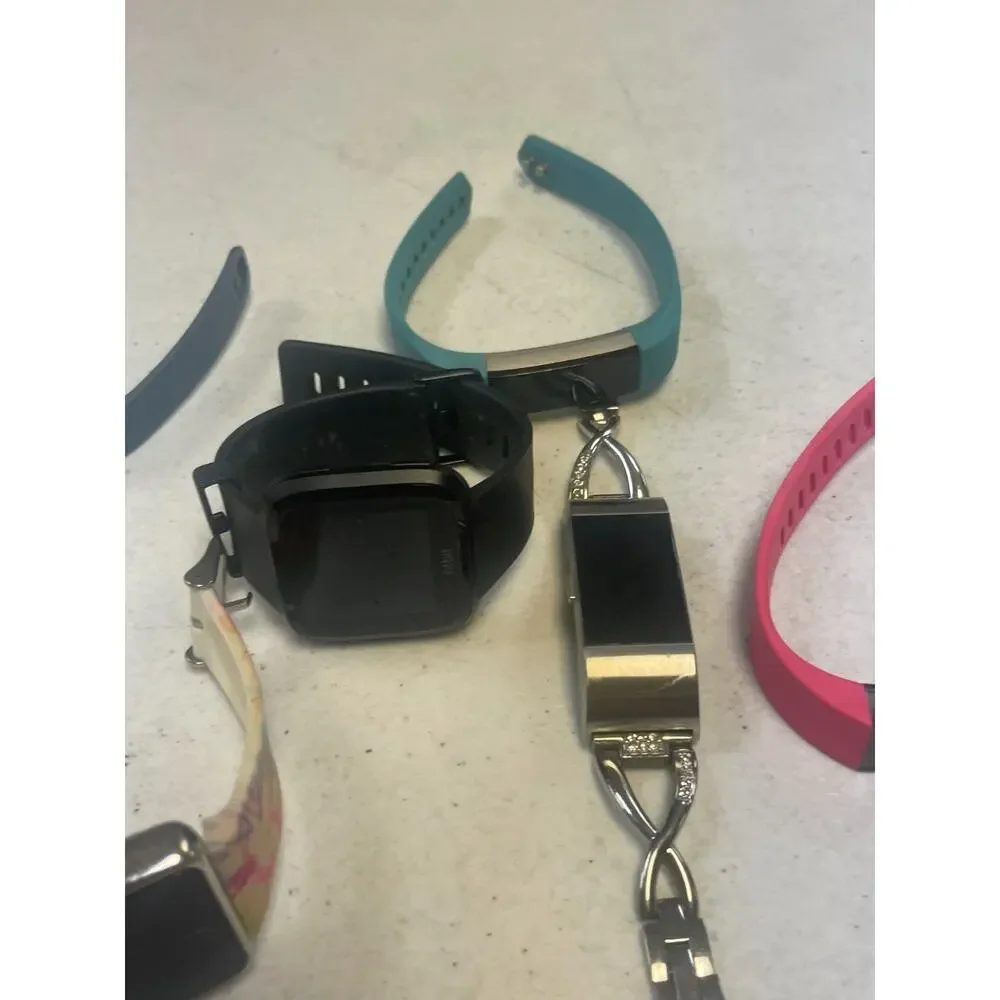 Lot of 7 Fitbit Mixed Brands Activity Tracker Smart Watches Untested For Parts